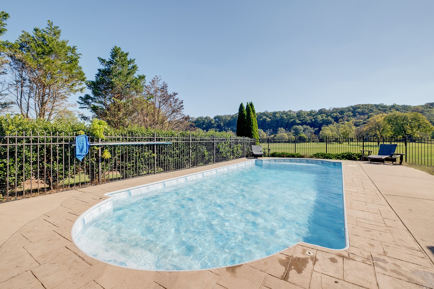 5210 Old Harding Road Franklin, TN 37064 - Photo 47 of 65 a view of a swimming pool with a yard