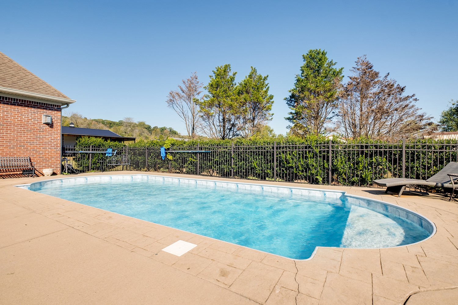 5210 Old Harding Road Franklin, TN 37064 - Photo 49 of 65 a view of a backyard with swimming pool