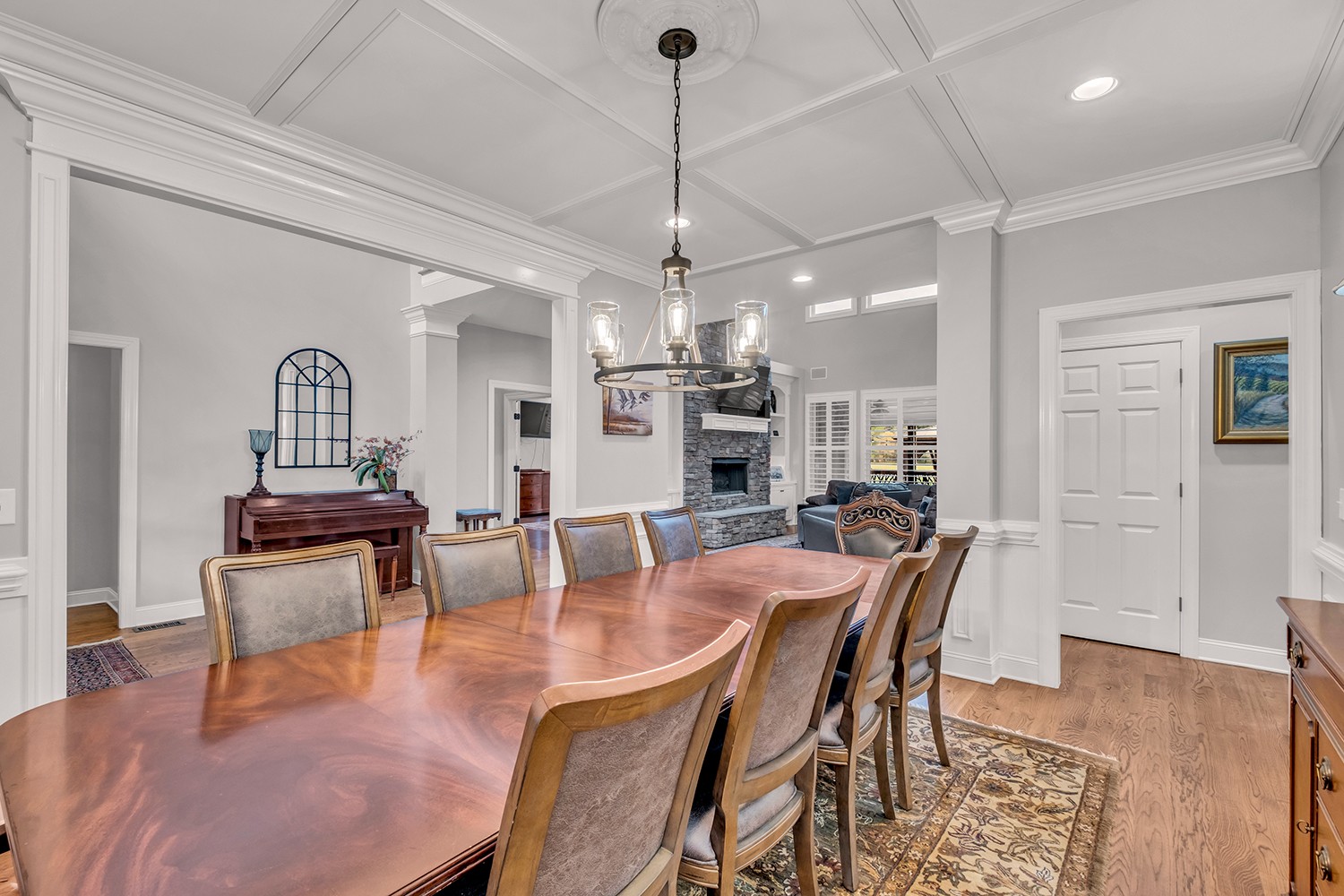 5210 Old Harding Road Franklin, TN 37064 - Photo 10 of 65 a dining room with furniture a chandelier and wooden floor