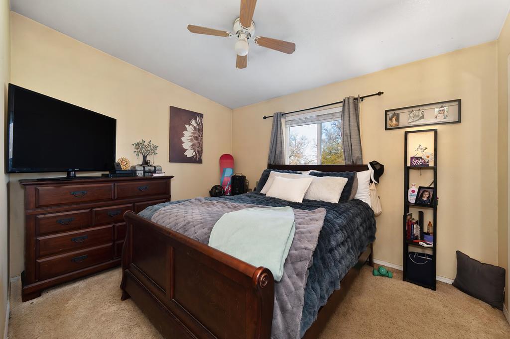 11425 Joeger Road Auburn, CA 95602 - Photo 13 of 52 a bedroom with bed and flat screen tv