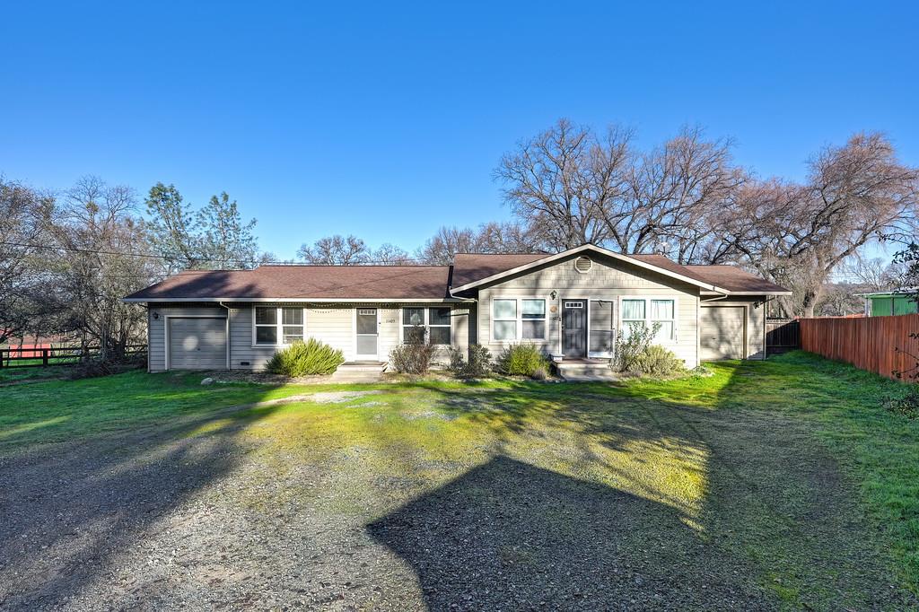 11425 Joeger Road Auburn, CA 95602 - Photo 2 of 52 a big house with a big yard and large trees