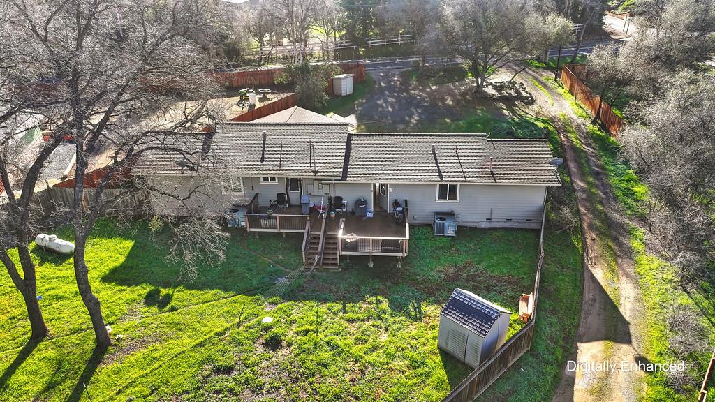 11425 Joeger Road Auburn, CA 95602 - Photo 35 of 52 a view of a house with backyard and sitting area