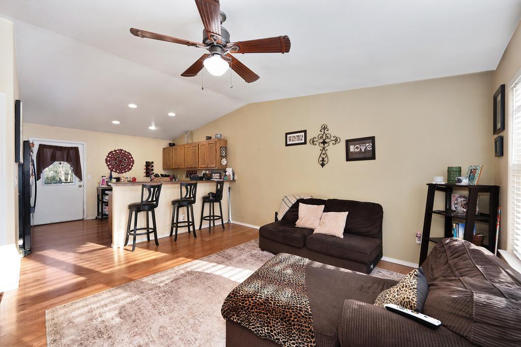 11425 Joeger Road Auburn, CA 95602 - Photo 6 of 52 a living room with furniture and a ceiling fan