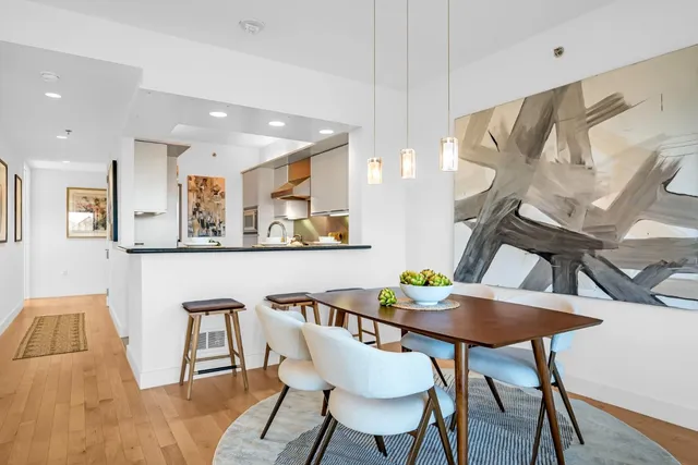 a view of a dining room with furniture