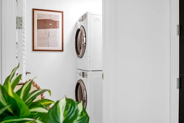 a picture of a bathroom with a shower