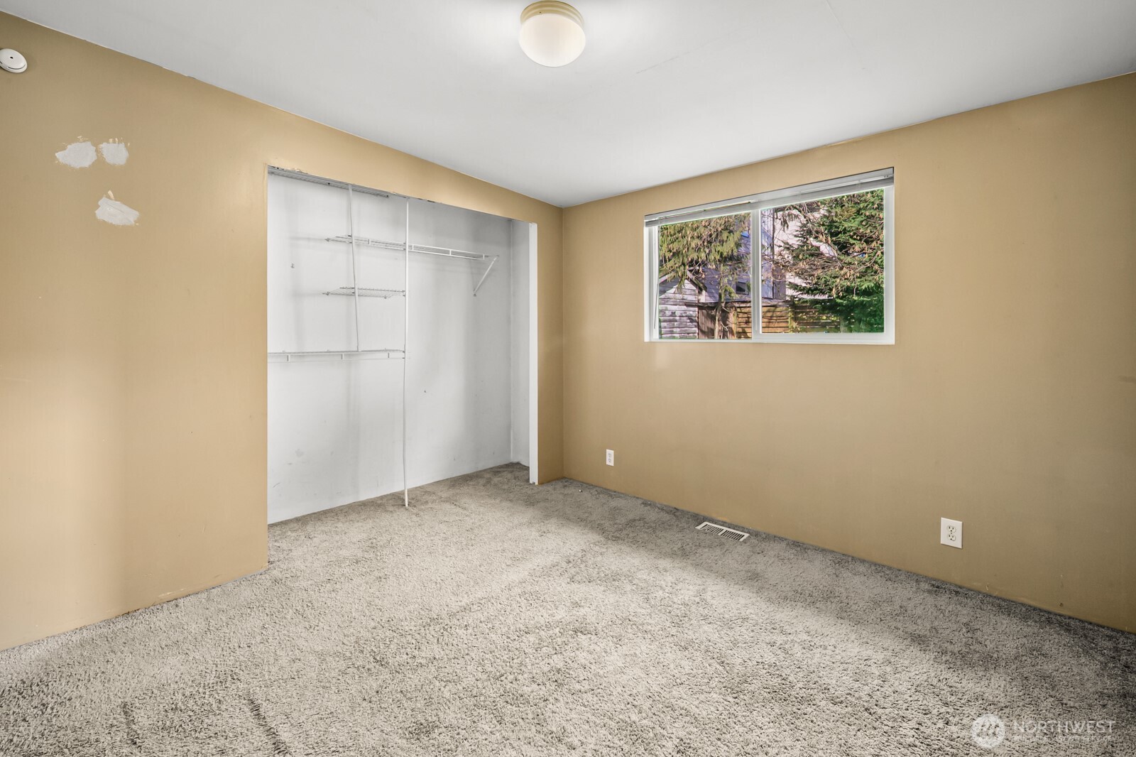946 North 86th Street Seattle, WA 98103 - Photo 13 of 26 an empty room with windows