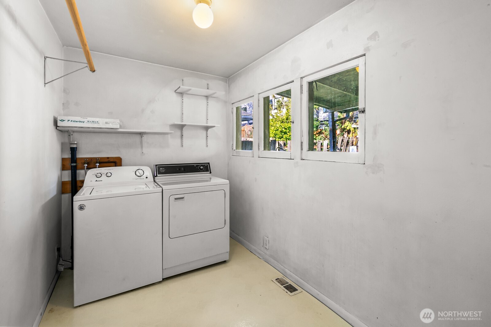 946 North 86th Street Seattle, WA 98103 - Photo 16 of 26 a utility room with dryer and washer