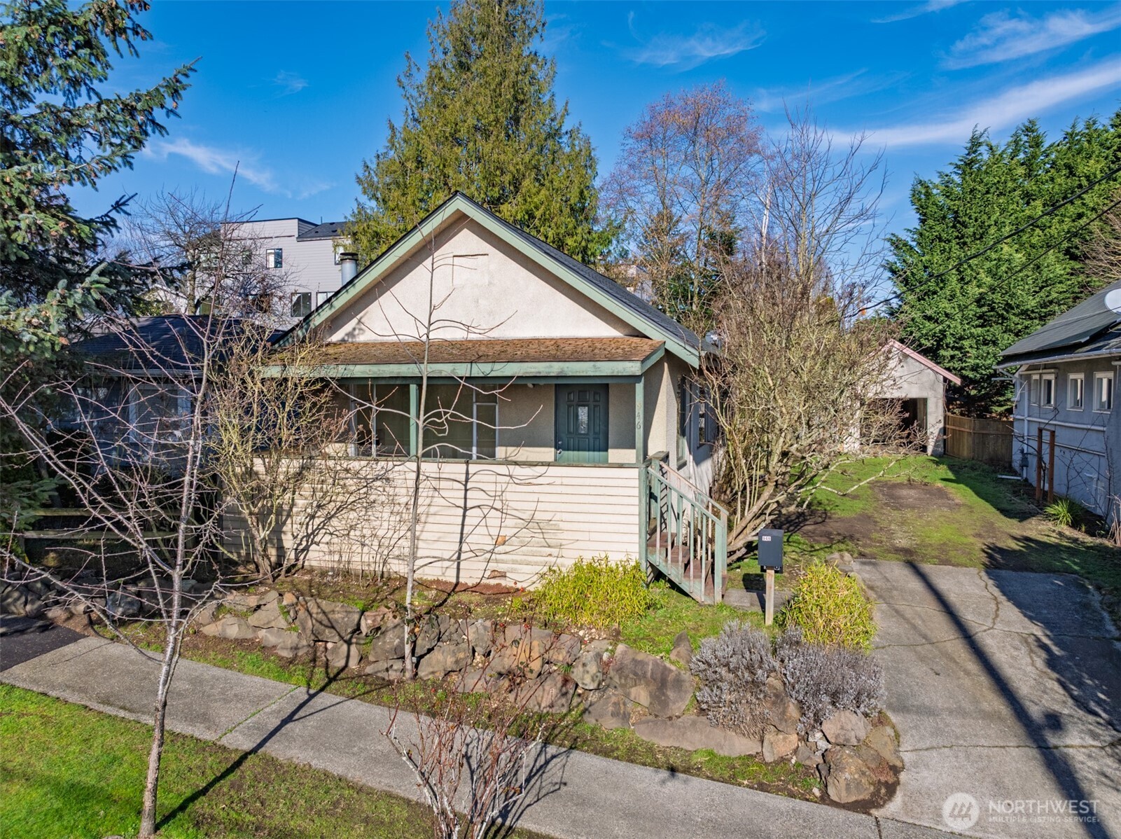 946 North 86th Street Seattle, WA 98103 - Photo 2 of 26 a front view of a house with garden