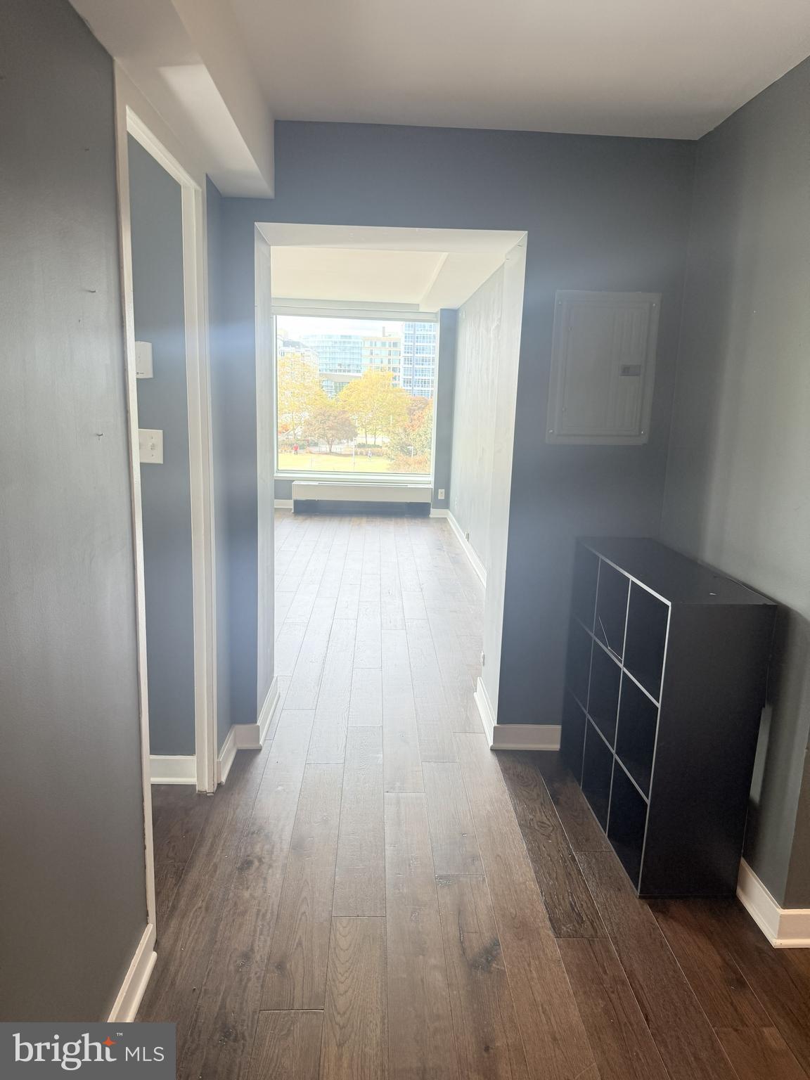 1101 3rd Street Southwest, Unit 306 Washington, DC 20024 - Photo 13 of 53 a view of empty room with wooden floor