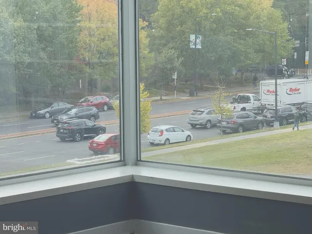 a bathroom with a shower and mirror