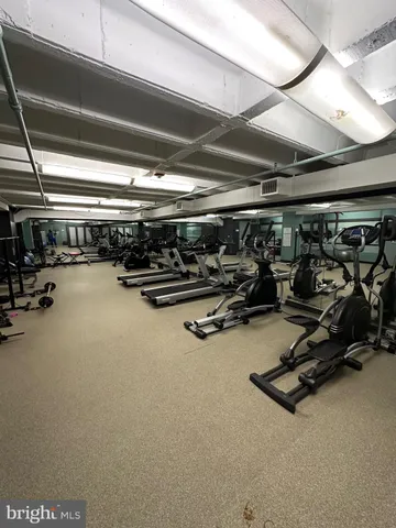 a view of a parked cars in front of a building