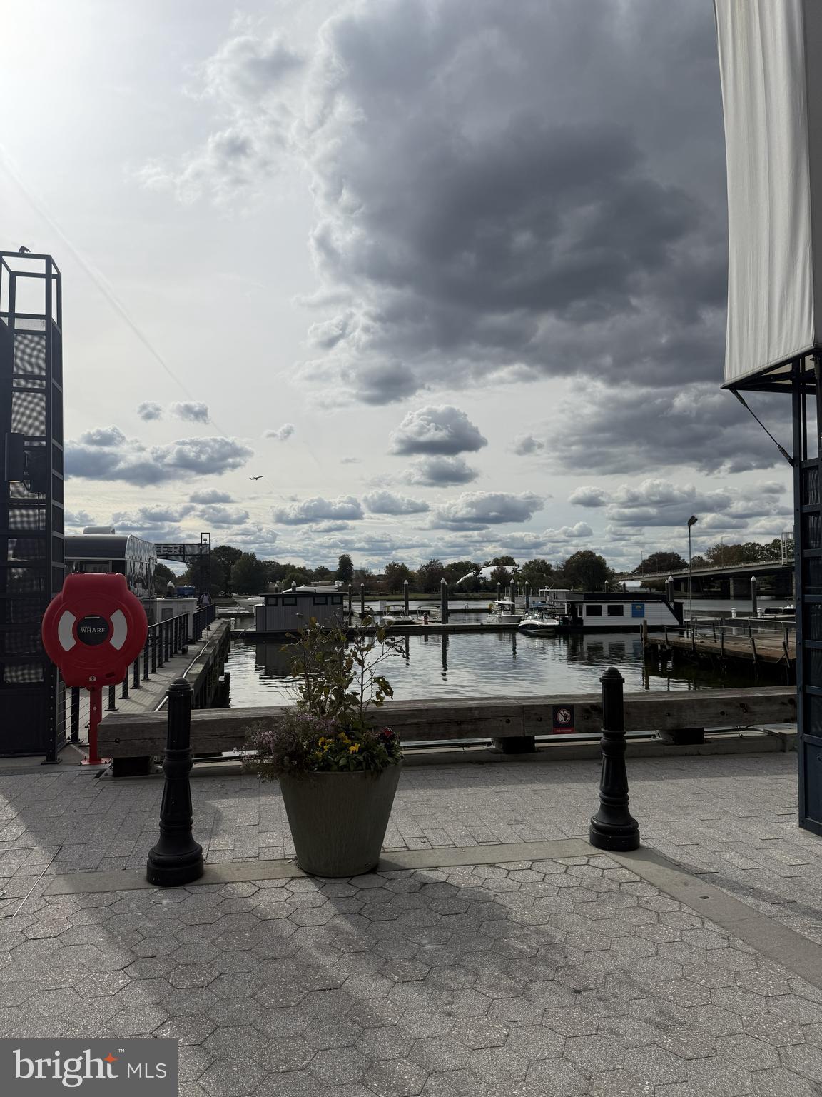 1101 3rd Street Southwest, Unit 306 Washington, DC 20024 - Photo 52 of 53 a view of roof deck with table and chairs