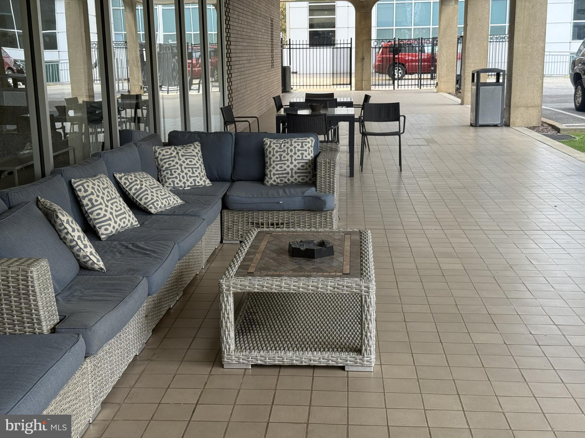 1101 3rd Street Southwest, Unit 306 Washington, DC 20024 - Photo 7 of 53 a living room with patio furniture and a fireplace