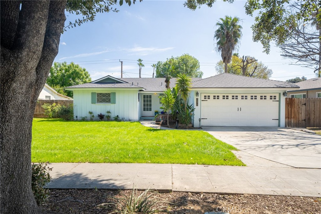 a house with a garden in front of it