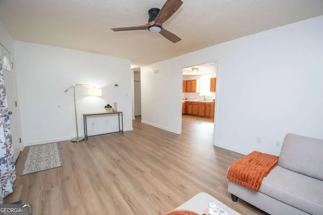 a view of livingroom with furniture and wooden floor