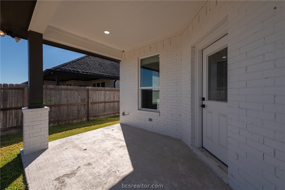 2908 GOLDBERG Drive Bryan, TX 77808 - Photo 37 of 44 Covered back porch off of the living area features covered porch, privacy wood fenced yard plus fully sodded yard and irrigation system.