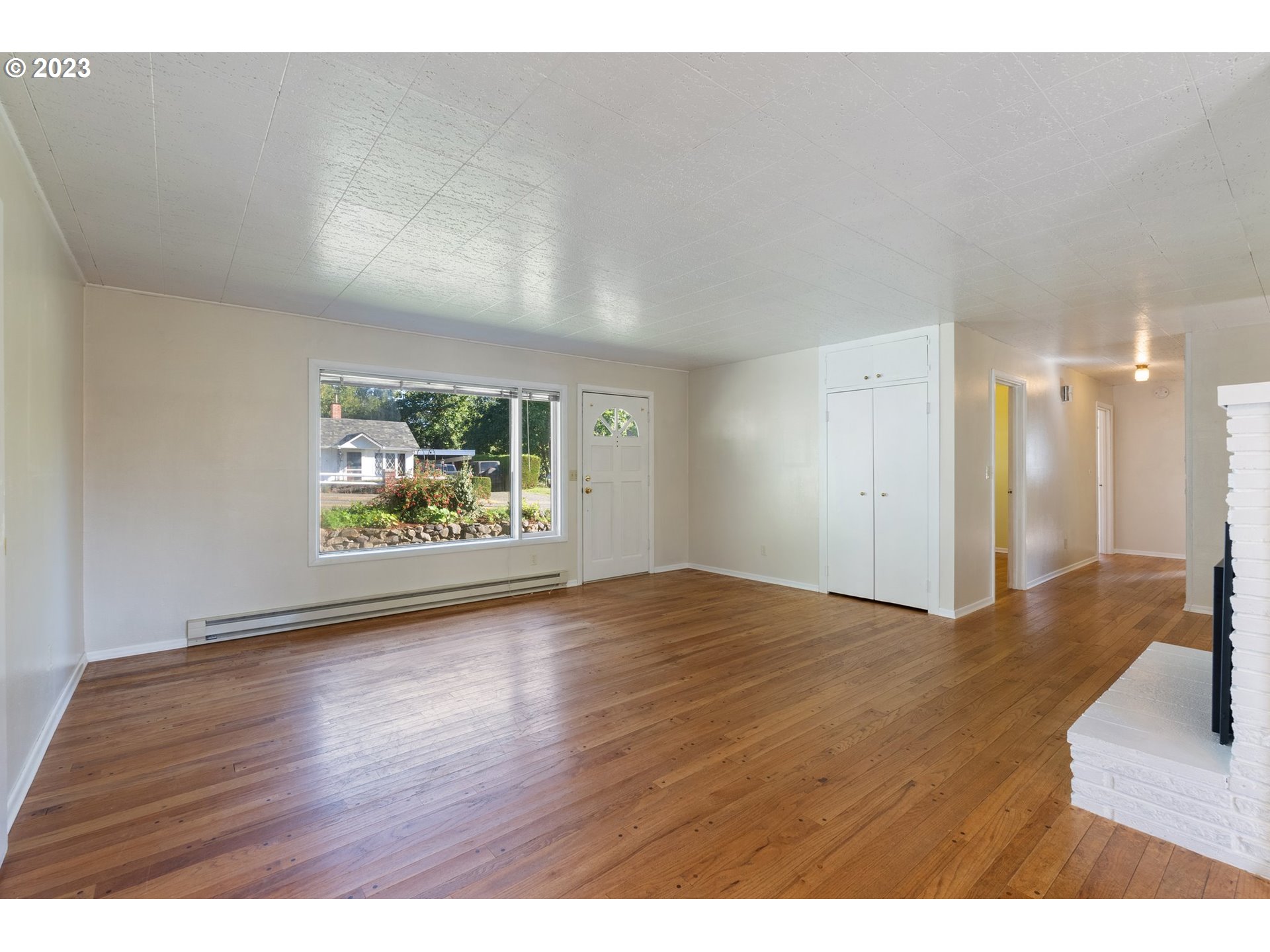 477 Northwest Chesser Road Stevenson, WA 98648 - Photo 30 of 40 a view of an empty room and wooden floor