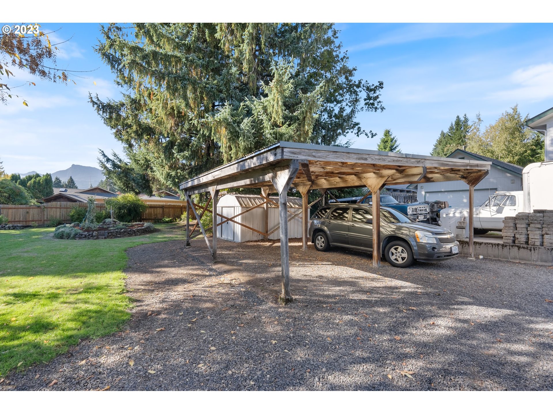 477 Northwest Chesser Road Stevenson, WA 98648 - Photo 32 of 40 a view of a cars park in front of a house