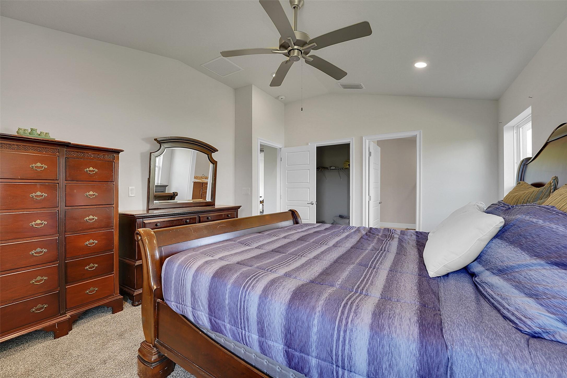 8600 Merano Avenue Fort Pierce, FL 34951 - Photo 12 of 22 a bedroom with a bed and a dresser