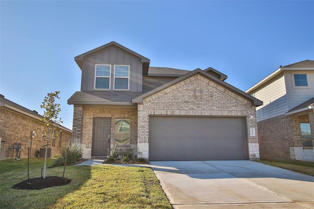 4023 Wyanngate Drive Spring, TX 77373 - Photo 1 of 23 a front view of a house with garden