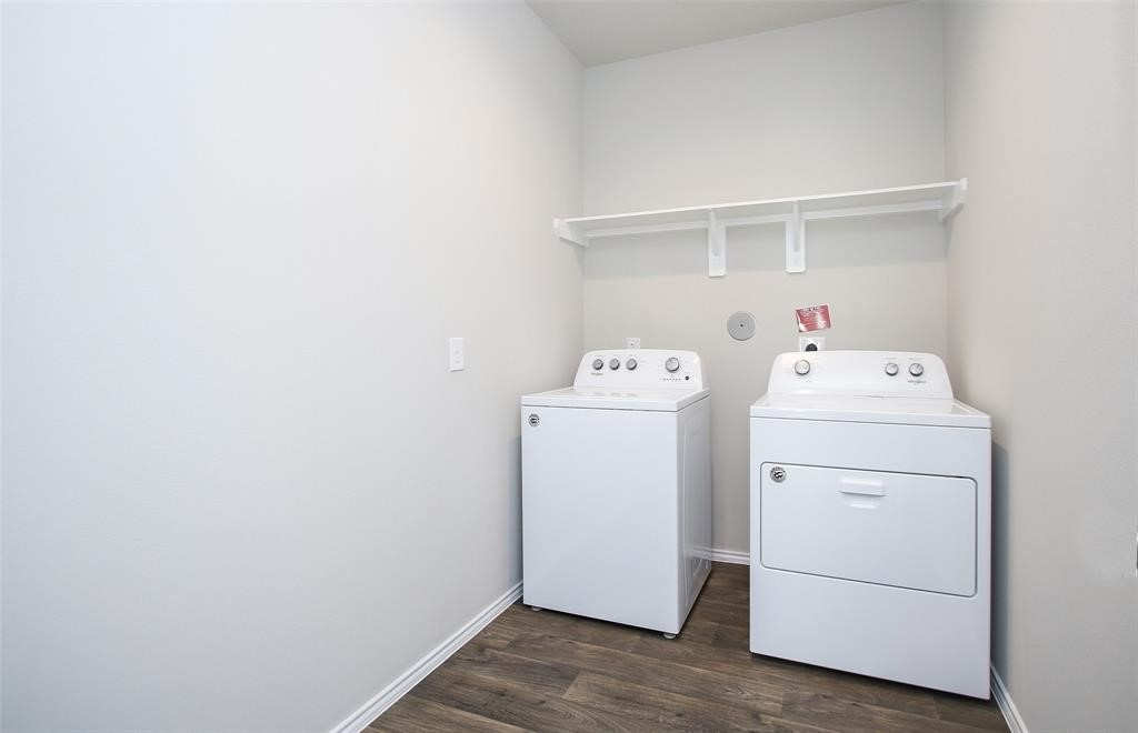 4023 Wyanngate Drive Spring, TX 77373 - Photo 12 of 23 a utility room with dryer and washer