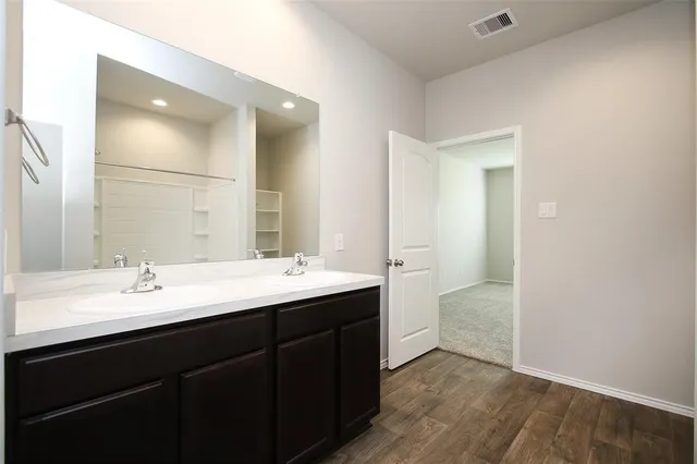 a view of an empty walk in closet