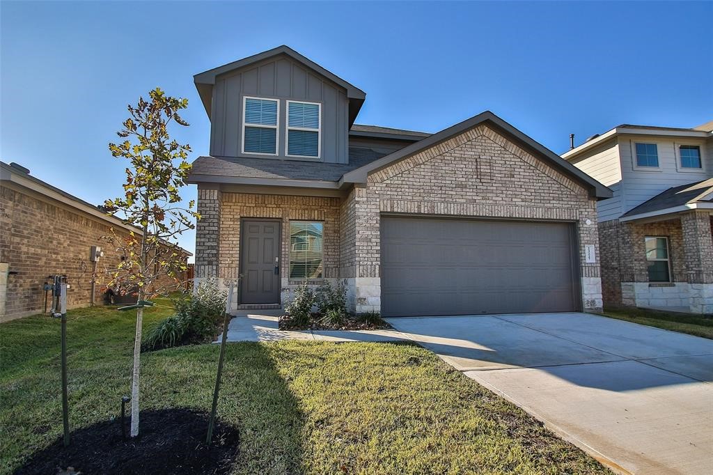 4023 Wyanngate Drive Spring, TX 77373 - Photo 2 of 23 a front view of a house with a garden