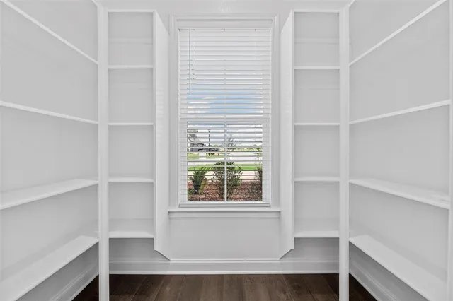 a view of a room that has a window