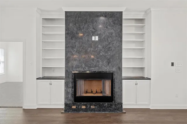 a living room with a fireplace