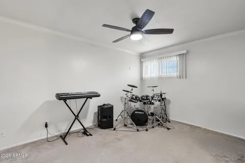 a view of a livingroom with a workspace