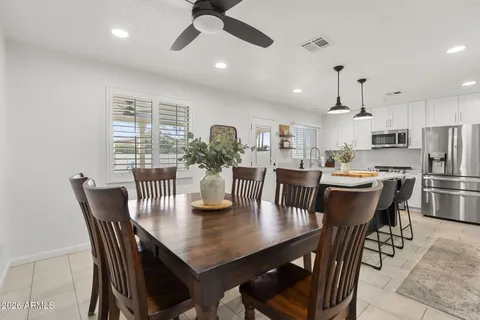a view of a dining room with furniture