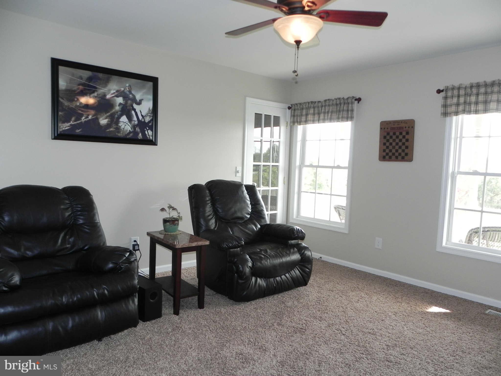 293 Fantasia Road Inwood, WV 25428 - Photo 14 of 30 Sunny Formal Living Room
