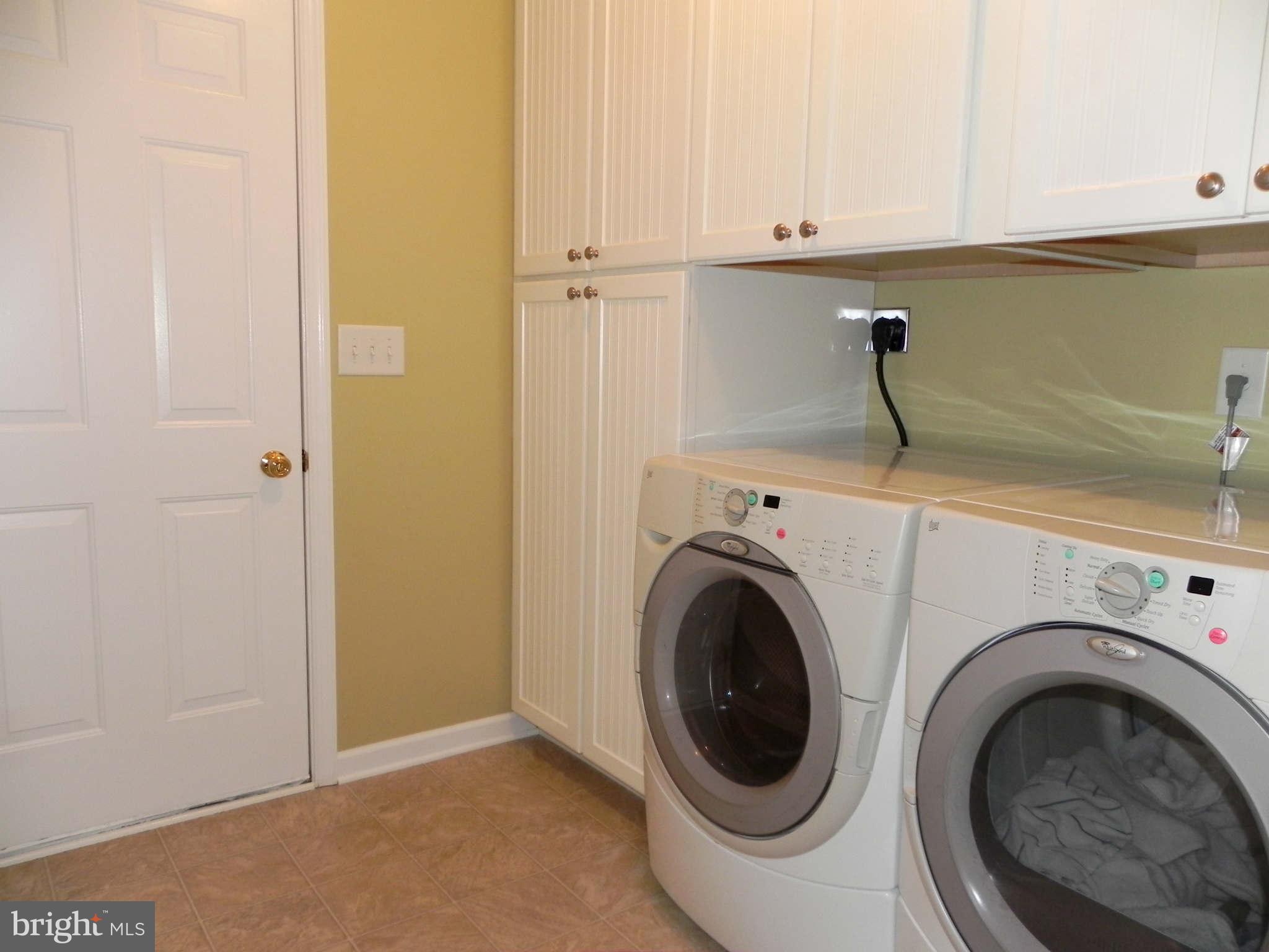 293 Fantasia Road Inwood, WV 25428 - Photo 15 of 30 Laundry / Mud Room w/ Cabinets