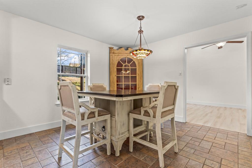 804 Alta Street Longview, TX 75604 - Photo 5 of 20 a view of a dining room with furniture and wooden floor