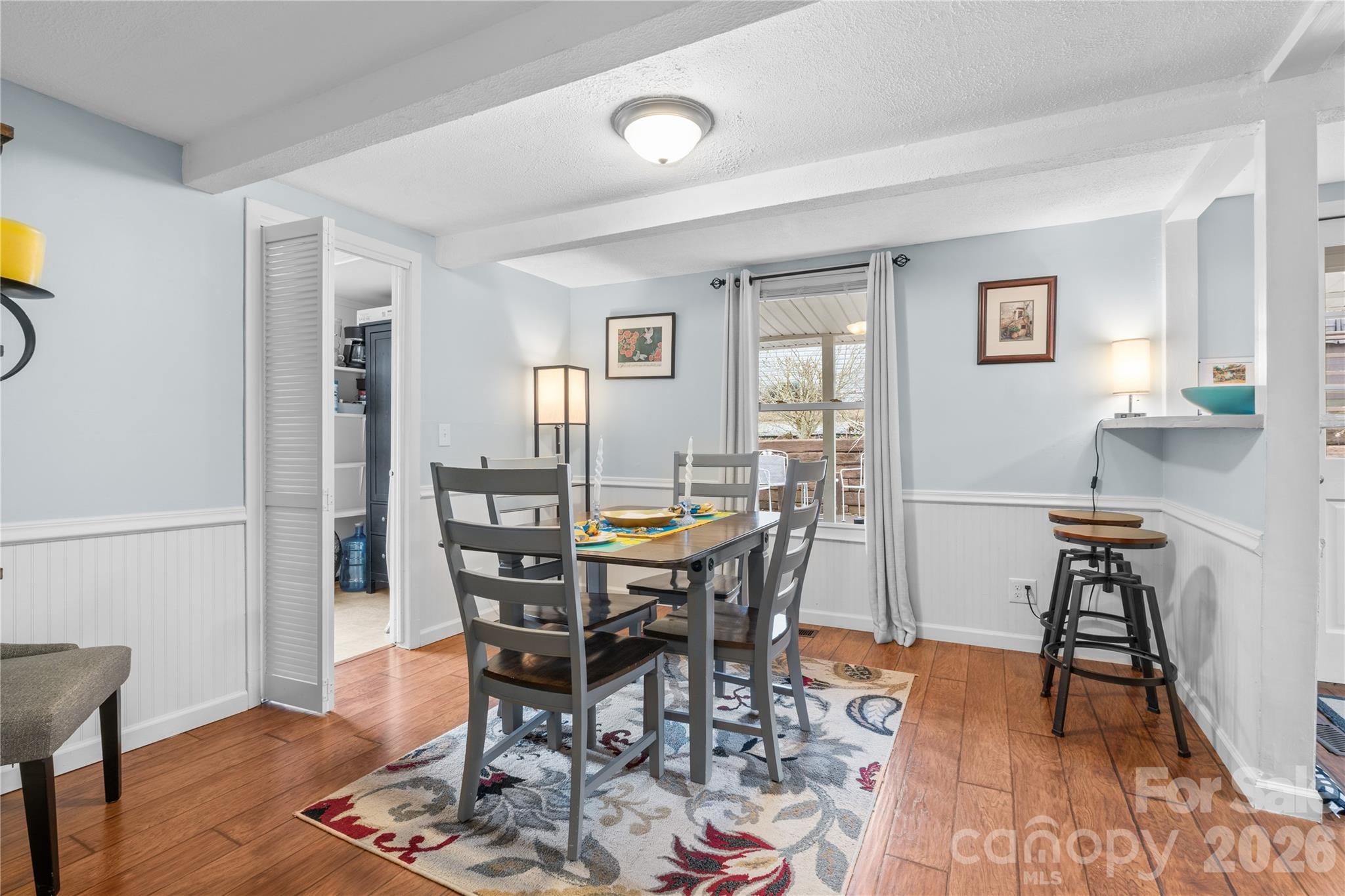 23 Maxwell Road Asheville, NC 28805 - Photo 14 of 47 a view of a dining room with furniture and wooden floor