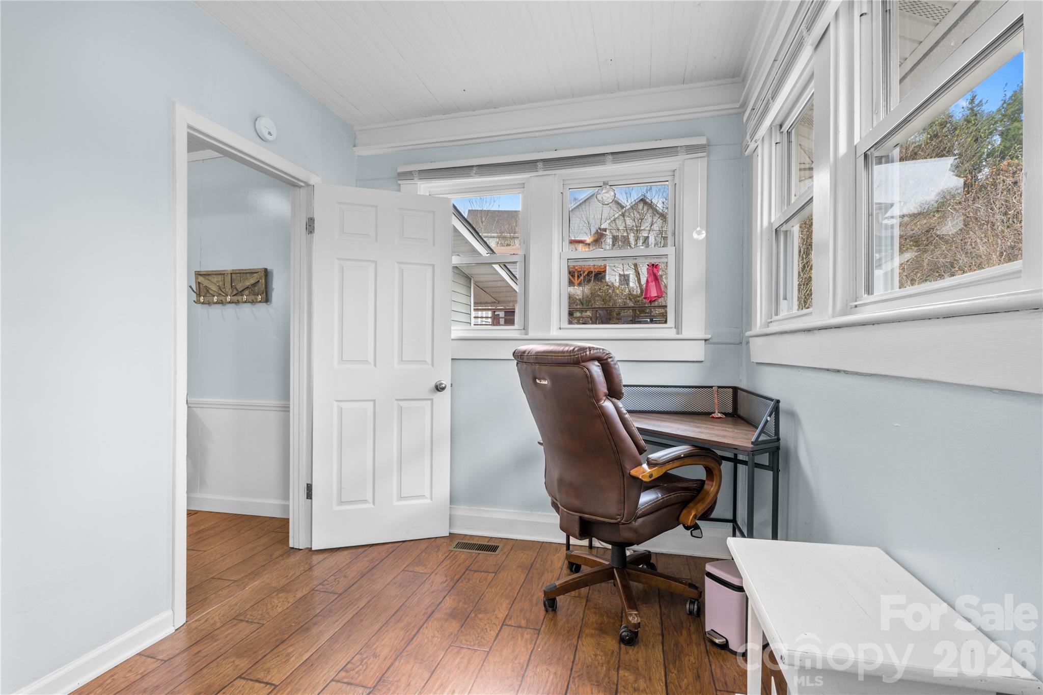 23 Maxwell Road Asheville, NC 28805 - Photo 20 of 47 a view of a workspace with furniture and a window