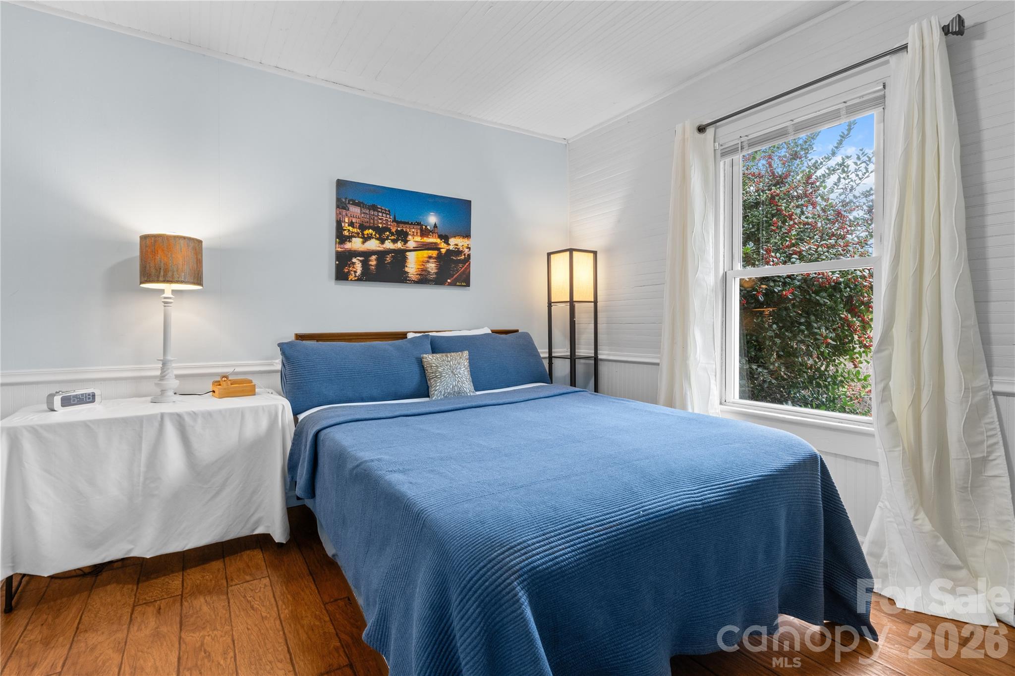 23 Maxwell Road Asheville, NC 28805 - Photo 27 of 47 a bedroom with a bed and a window