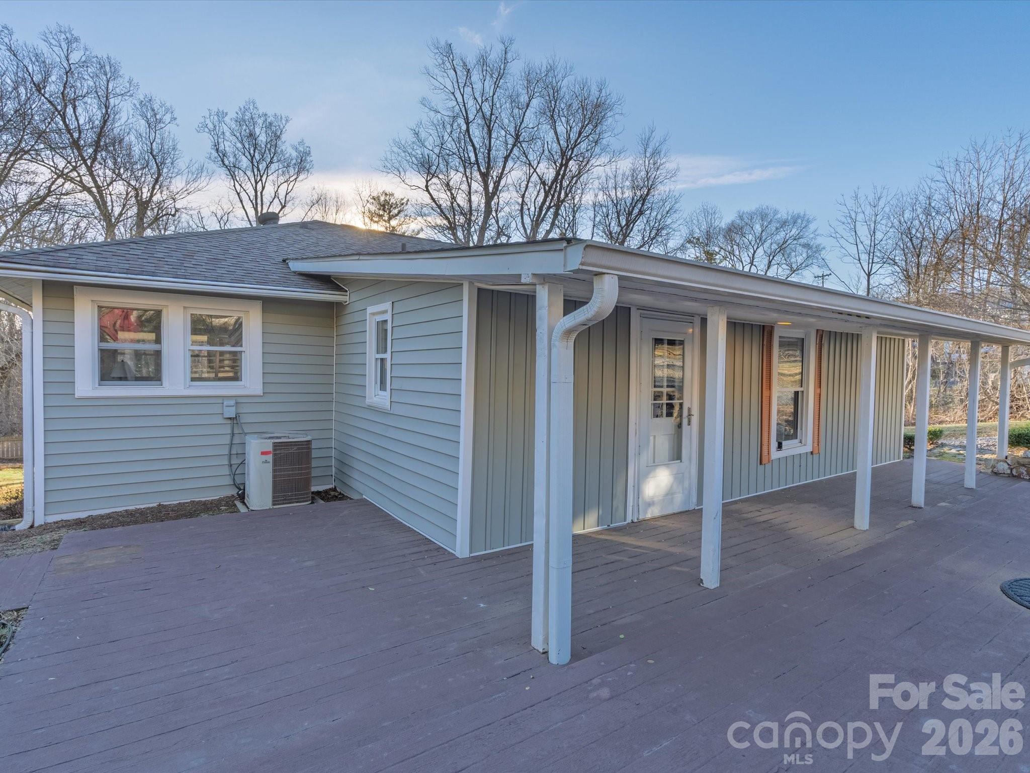 23 Maxwell Road Asheville, NC 28805 - Photo 29 of 47 a view of a house with a yard and garage