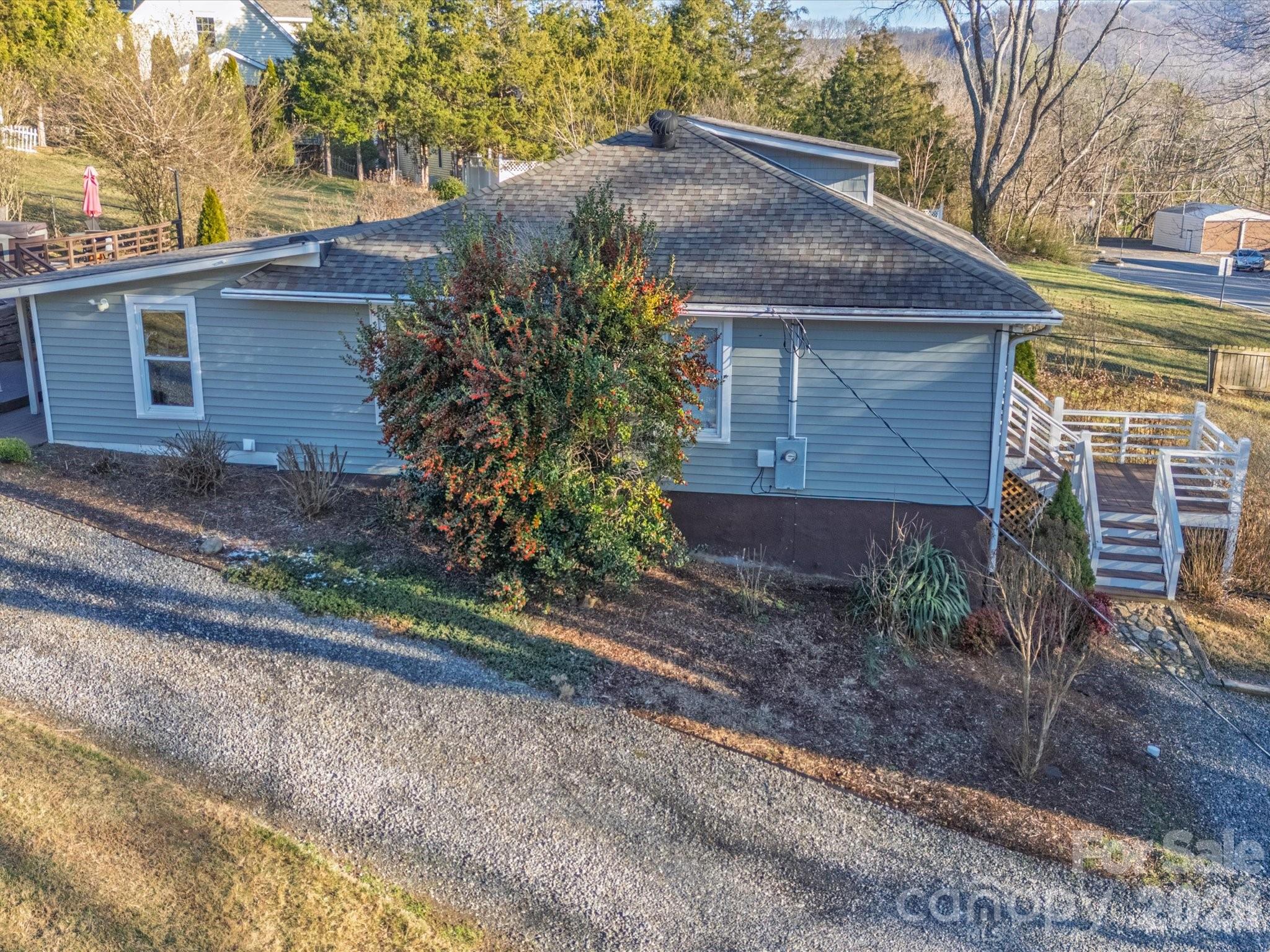 23 Maxwell Road Asheville, NC 28805 - Photo 35 of 47 a front view of a house with garden