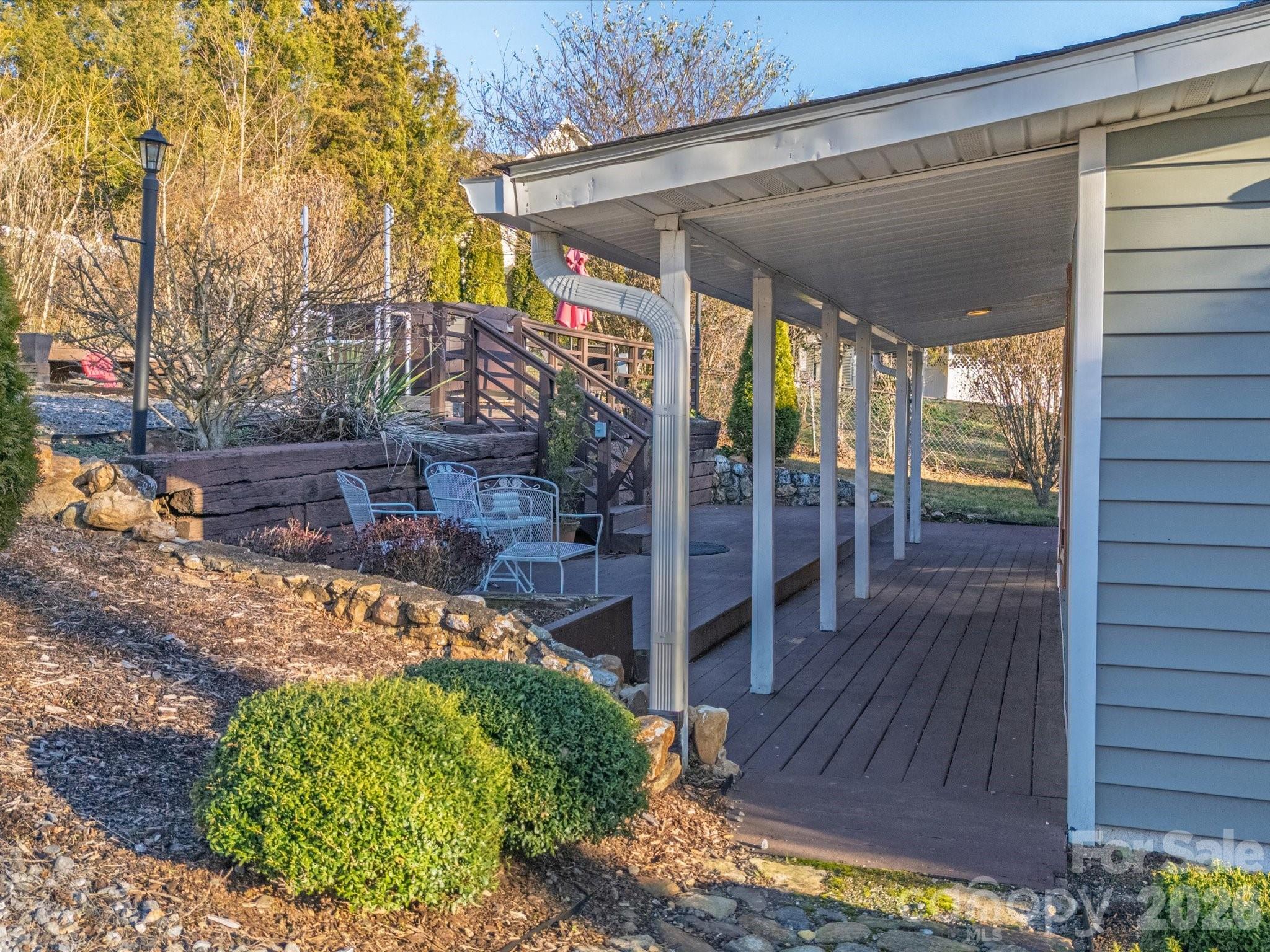 23 Maxwell Road Asheville, NC 28805 - Photo 39 of 47 a view of a porch with wooden floor