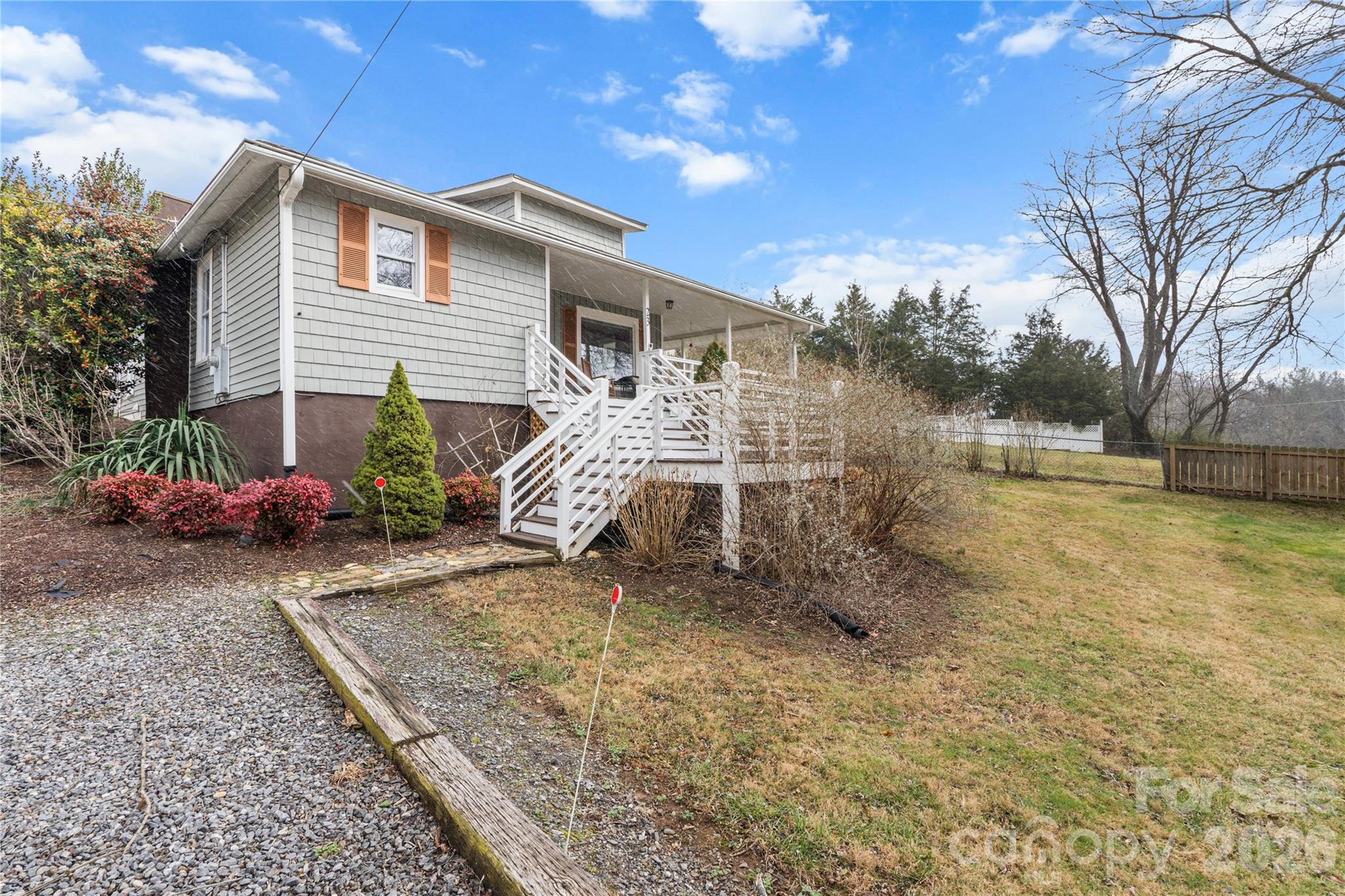 23 Maxwell Road Asheville, NC 28805 - Photo 41 of 47 a front view of a house with garden
