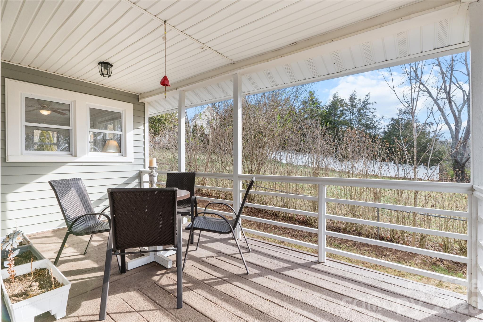 23 Maxwell Road Asheville, NC 28805 - Photo 5 of 47 a view of a porch with furniture and a yard