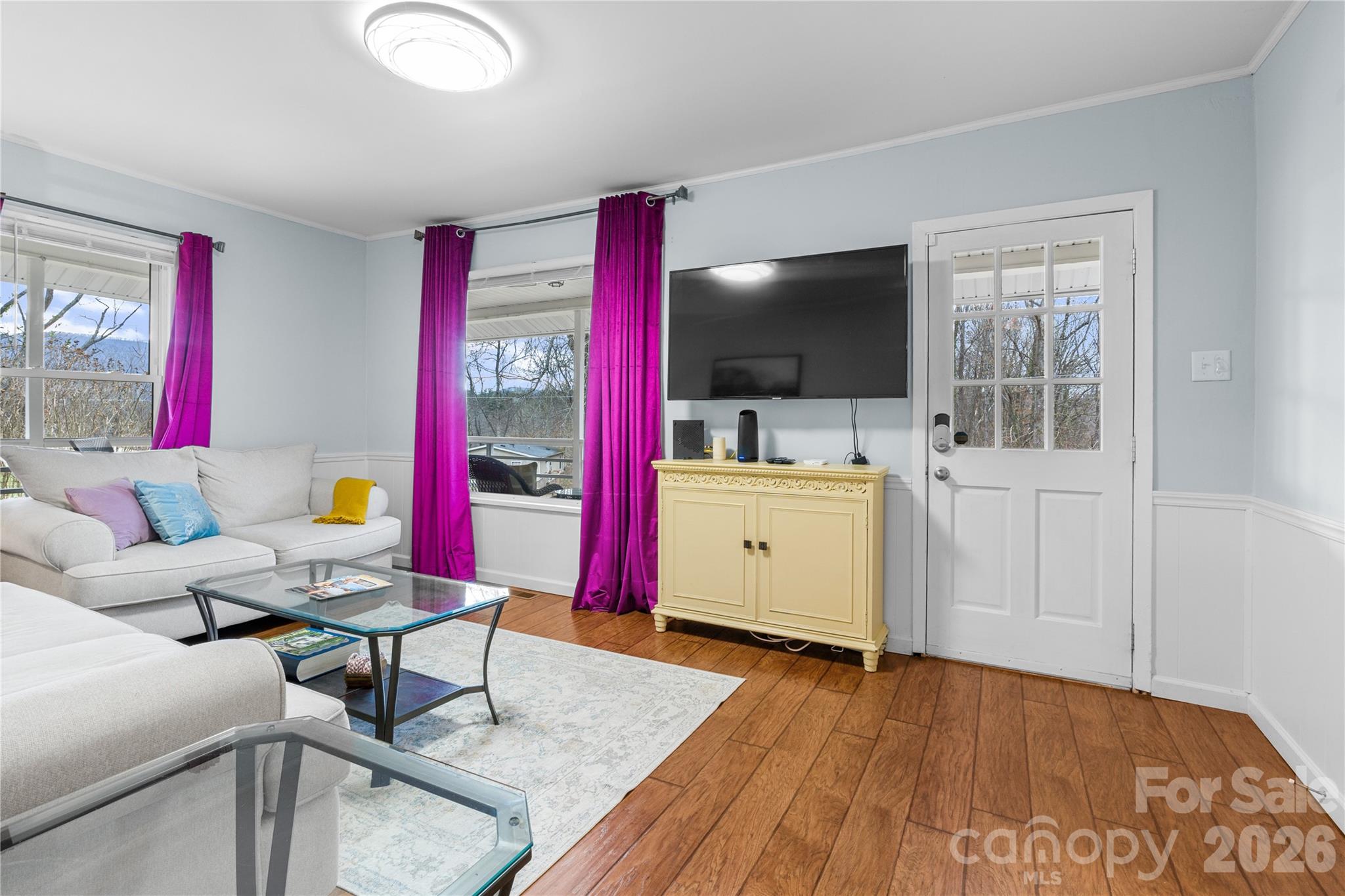 23 Maxwell Road Asheville, NC 28805 - Photo 6 of 47 a living room with furniture and a flat screen tv