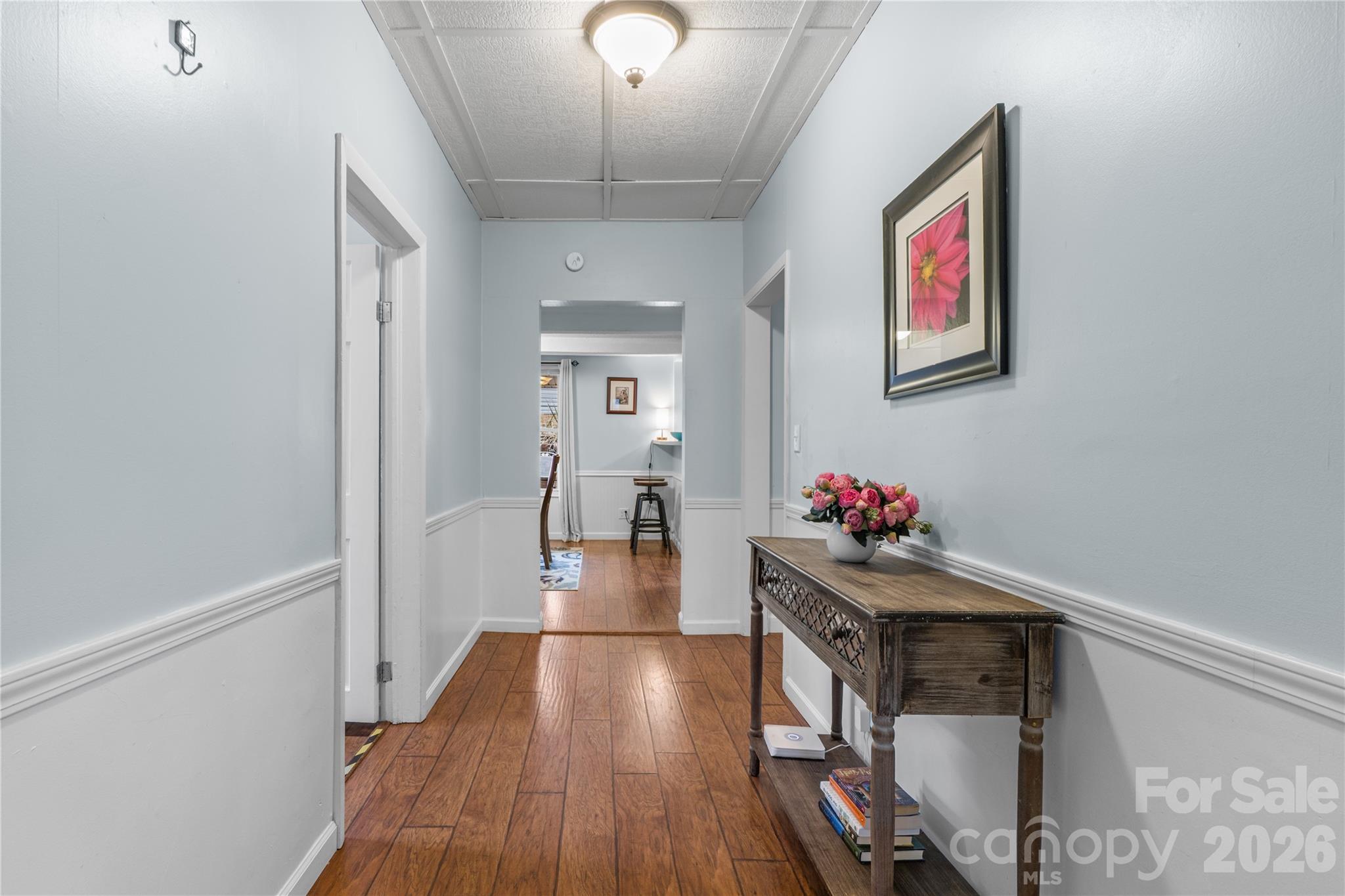 23 Maxwell Road Asheville, NC 28805 - Photo 8 of 47 a living room with furniture and a wooden floor