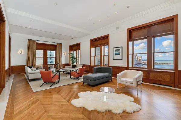 a living room with furniture and a table