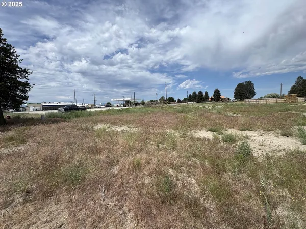a view of an ocean and sunset