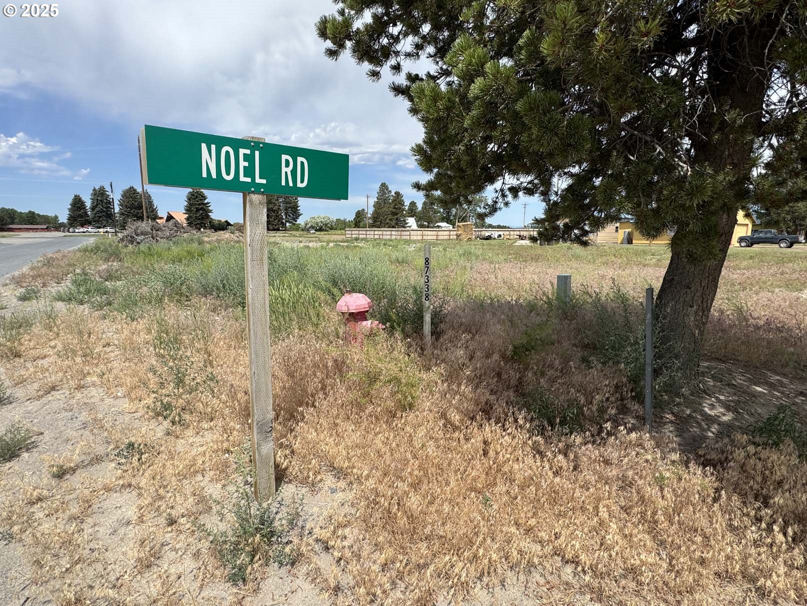 Holly Lane, Unit 600 Christmas Valley, OR 97641 - Photo 7 of 17 a front view of a house with garden