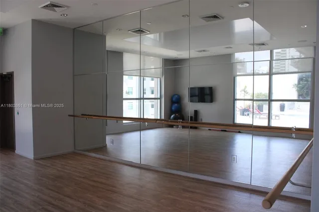 a view of a room with gym equipment