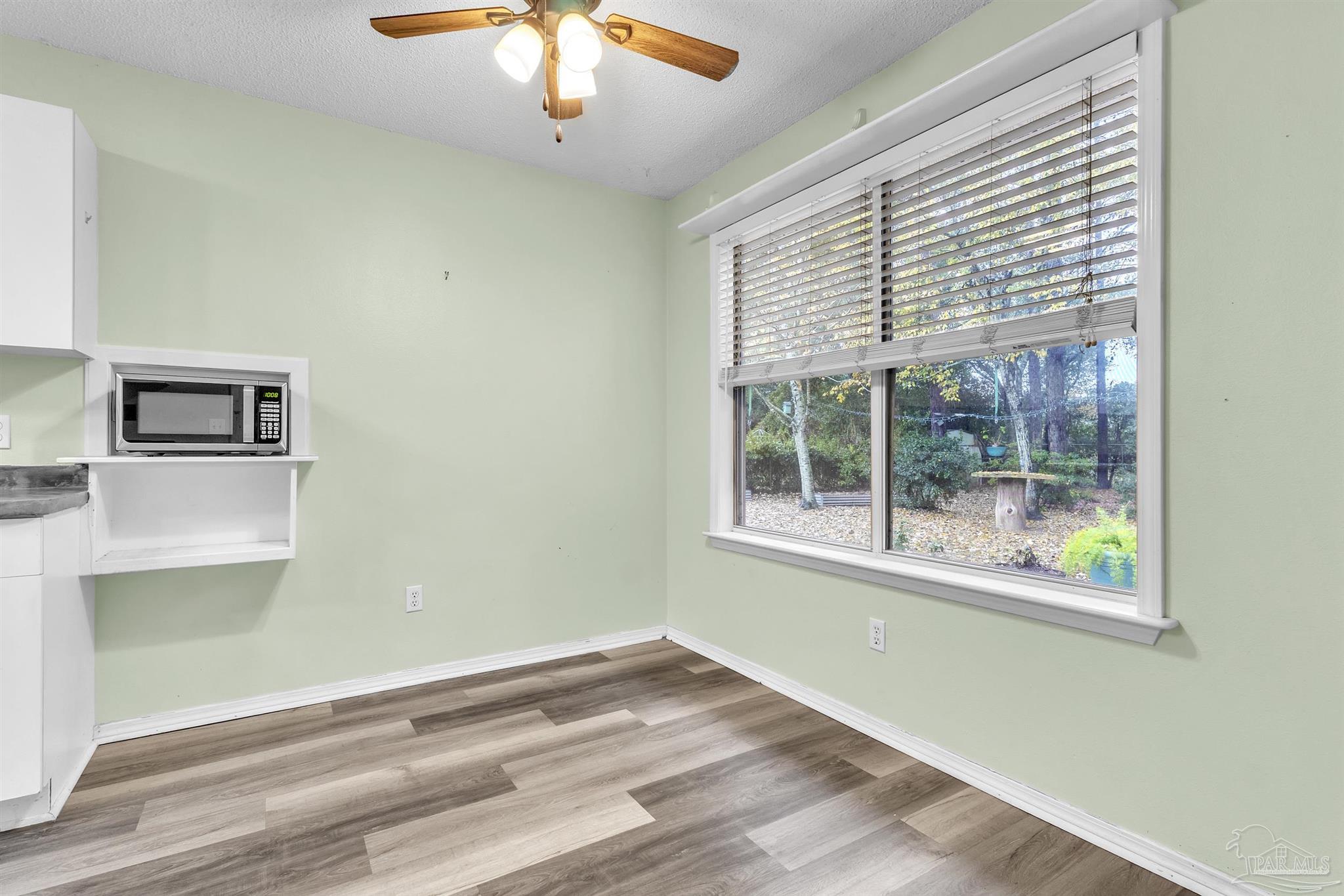 4331 Chantilly Way Milton, FL 32583 - Photo 13 of 30 an empty room with a window