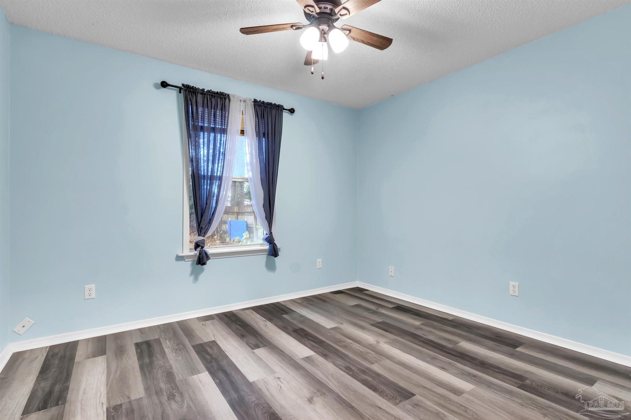 4331 Chantilly Way Milton, FL 32583 - Photo 16 of 30 an empty room with a window
